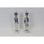 Two Lladro porcelain band figures - boy with horn and boy with drum