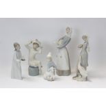 Five Lladro porcelain figures - girl with lamb, girl with candlestick, lady with goose,