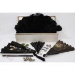 Large Victorian Duvelleroy fan box containing black ostrich feather fan and two painted fans,