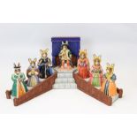 Complete set of Royal Doulton Bunnykins Tudor Collection figures and stand (9)