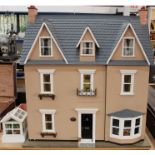 Good quality Victorian-style dolls house with working lights,