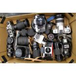 Two boxes containing a selection of cameras, lenses, etc - including Sigma EX 28-70, Zeiss, Canon,