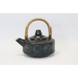 Rare Troika pottery teapot with original wicker / cane handle and drum-shaped body