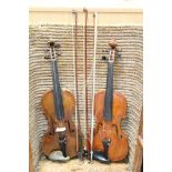 Old violin with two bows in a fitted case, together with another,
