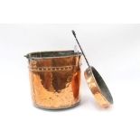 Large copper bucket with bead decoration and brass swing handle,