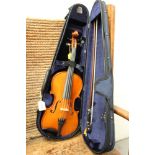 Good quality modern three-quarter size violin by Genial Violins, Toplita, Romania, dated 2007,