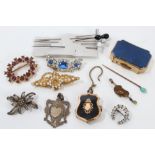 Small group of vintage costume jewellery - including hat pins and silver fob