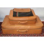 Pair of vintage Norris leather suitcases with tartan lining,