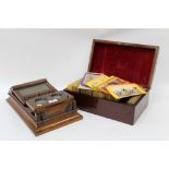 Good quality rosewood stereoscopic viewer and a large collection of stereoscopic cards - including