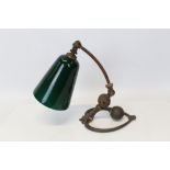 Early 20th century brass Art Nouveau-style desk lamp with green glass shade CONDITION