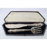 Pair Victorian silver fish servers with foliate decorated silver blades and handles,