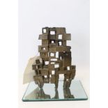 Unusual 1960s bronze sculpture on a rectangular plate glass mirror base, by Margaret Lovell,