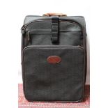 Vintage Mulberry black scotch grain suitcase on wheels, with multicoloured tartan fabric lining,