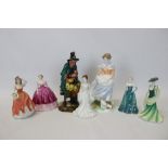 Two Royal Doulton figures - The Mask Seller HN2103 and To Show I Care,