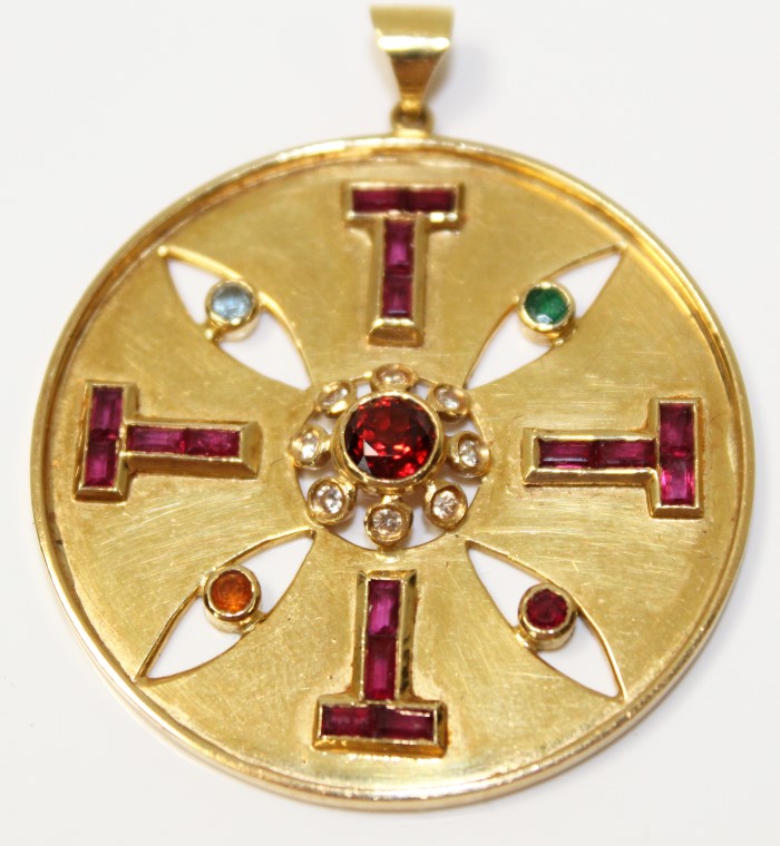 1980s gold (18ct) Aztec-style pendant,