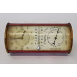 Jaeger combination desk alarm clock and barometer of cylindrical form,