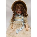 Doll - Schoenau & Hoffmeister bisque head 906-14 - large size, blue sleeping eyes, painted brows,