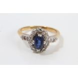 1920s gold (18ct) sapphire and diamond cluster ring in platinum setting, with diamond set shoulders.