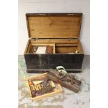 Antique tool chest containing antique woodworking tools, moulding planes,