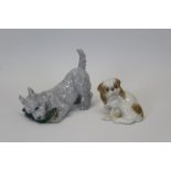 Royal Copenhagen porcelain model of a terrier chewing a slipper,
