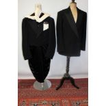 Gentlemen's 1938 black tailcoat, grosgrain lapel, silk-lined, central vent to waistline,