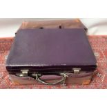 Vintage blue leather suitcase with canvas protective case,