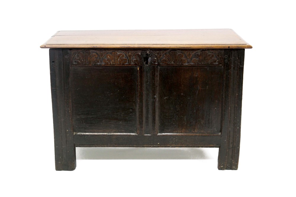 17th century oak coffer of small size, associated plank top with moulded edge,