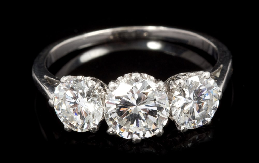 Fine diamond three-stone ring, with three brilliant cut diamonds in claw setting, - Image 2 of 4