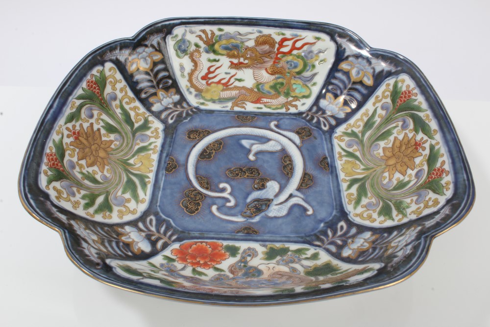 Late 19th century Japanese porcelain dish with raised polychrome decorated dragon,