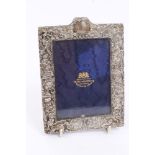 Late Victorian Goldsmiths & Silversmiths Company silver photograph frame of vertical rectangular