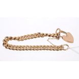 Early 20th century 9ct rose gold bracelet with heavy curb links and padlock clasp,