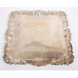 Edwardian silver salver of square form, in the manner of Paul De Lamerie,