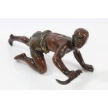 Good 19th century bronze and patinated bronze figure modelled as a crawling Negro with knife,