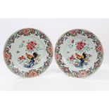 Pair mid-18th century Chinese famille rose plates painted with cockerels and flora, 22.