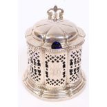 Victorian silver mustard pot of shaped octagonal form, with panels of pierced decoration,