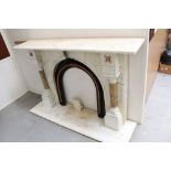 Good Victorian marble fireplace of large size, with expansive mantelpiece on arched frame,