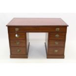 19th century mahogany desk with tooled leather top and six drawers about the kneehole,