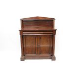 Early Victorian mahogany chiffonier with arched gallery back and shelf, raised on turned columns,