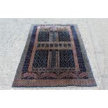 Persian Qum silk rug - segmented field with cream detail on midnight-blue ground,