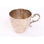 White metal cup or beaker of conical form,