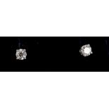 Pair diamond single stone stud earrings, each with a brilliant cut diamond in four-claw setting,