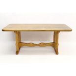 Contemporary carved ash refectory table by Graham Pearson of Mistley,