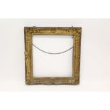 19th century gilt gesso picture frame with C-scroll and shell ornament,