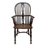 Good 19th century yew and elm Windsor chair with pierced vase-shaped splat and saddle seat on