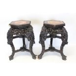 Pair of late 19th / early 20th century Chinese carved hardwood and marble inset urn stands,