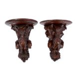 Pair of late 19th / early 20th century Black Forest carved wall brackets in the form of game birds,