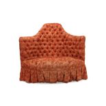 Early 20th century button-upholstered corner chair with scalloped back,