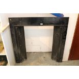 Victorian Gothic cast iron fire surround with tracery ornaments, total dimensions 107cm x 104cm,
