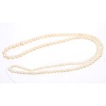 Cultured pearl opera-length necklace with a string of graduated cultured pearls measuring 5.