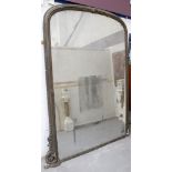 Exceptionally large Victorian overmantel mirror of arched form, with original mirrored plate,